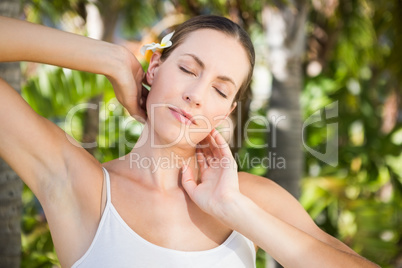 Beautiful natural brunette looking at camera