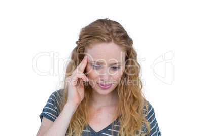 A blonde woman having headache