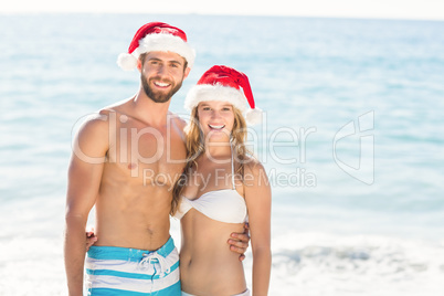 happy couple with Christmas hat