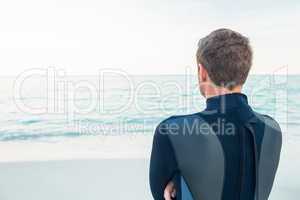 Man in wetsuit on a sunny day