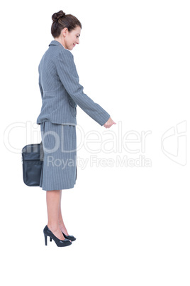 A businesswoman is gesturing