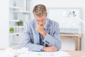 Businessman being depressed by working