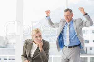 Furious boss yelling at colleague