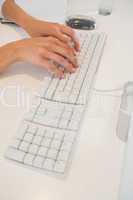 Woman writting on his keyboard
