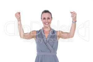 Businesswoman gesturing with raised arms