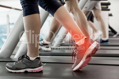 Highlighted ankle of woman on treadmill