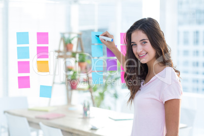 Smiling women writing photo editor