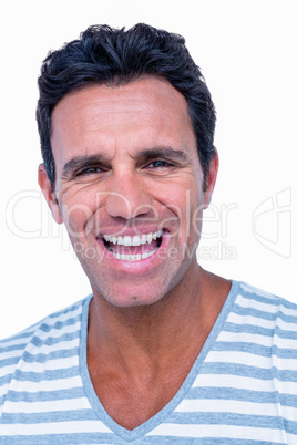 Happy man laughing at camera