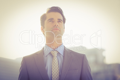 Businessman relaxing outside