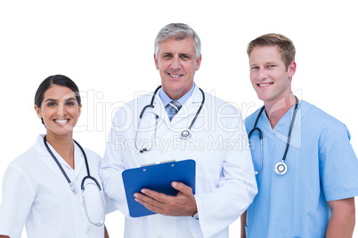 Doctors and nurse discussing over notes