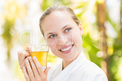 Attractive woman drinking tea