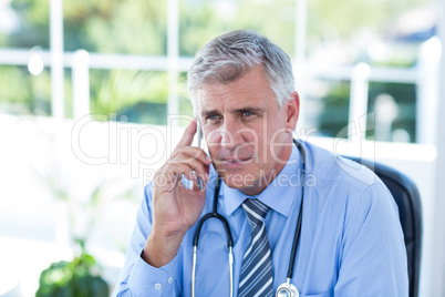 Doctor having phone call