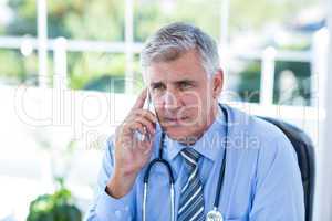 Doctor having phone call