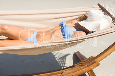 Pretty woman sleeping in the hammock