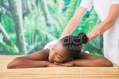 Pretty woman enjoying a back massage