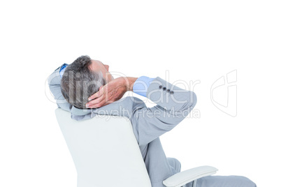 man sitting on office chair and relaxing