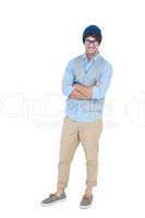 Geeky hipster with arms crossed looking at camera