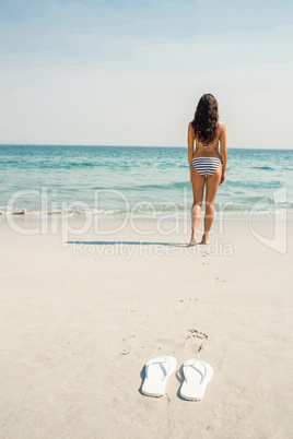 Rear view of woman looking at the ocean