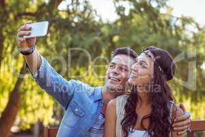 Cute couple taking a selfie