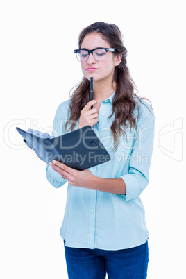 Pretty geeky hipster checking her diary