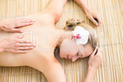 Attractive woman getting massage on her back