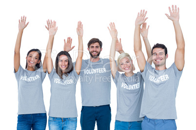 Volunteers raising their hands