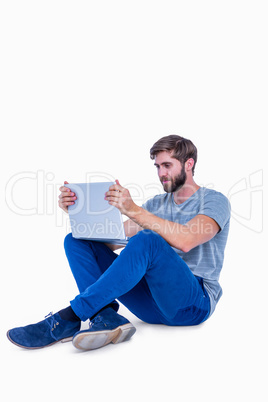 Handsome man using laptop computer