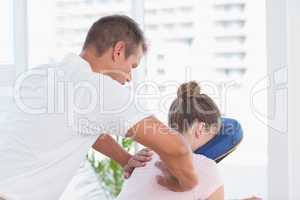 Woman having back massage