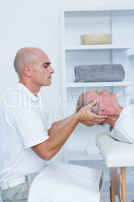 Man receiving head massage