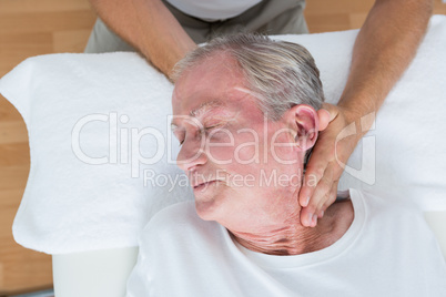 Man receiving neck massage