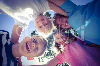 Smiling children looking down the camera Smiling children looking down the camera