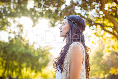 Pretty hipster relaxing in the park