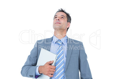 excited cheering businessman holding his laptop