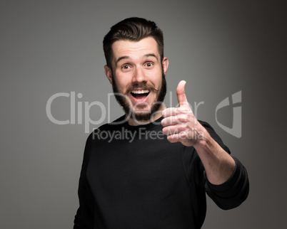 portrait of handsome young smiling man