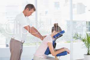 Woman having back massage