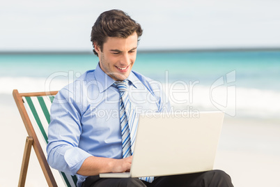 Businessman using his laptop