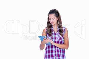 Pretty brunette using tablet computer