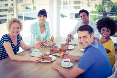 Business people having dessert