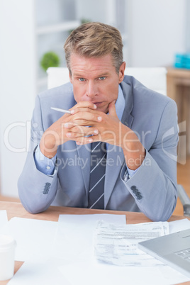 Businessman being depressed by working