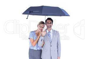 Business people holding a black umbrella