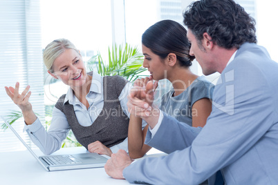 Business people in discussion in an office