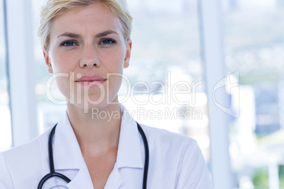 Confident doctor looking at camera