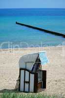Roofed wicker beach chair