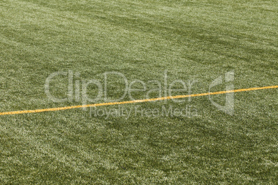 football pitch with yellow lines