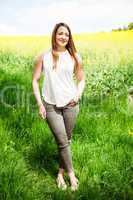 Woman in nature before the rape field