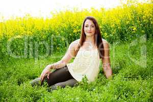 Woman in nature before the rape field