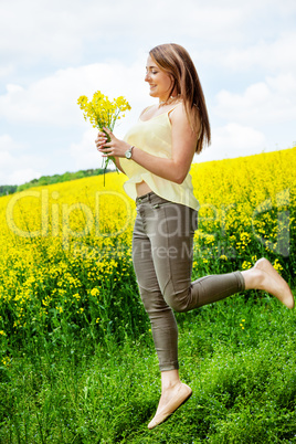 Woman in nature before the rape field