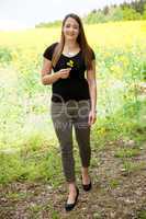 Woman in nature before the rape field