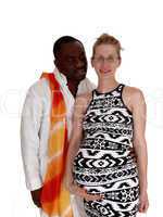Black man whit his pregnant white woman.