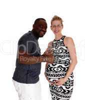 Happy white woman pregnant, black man.